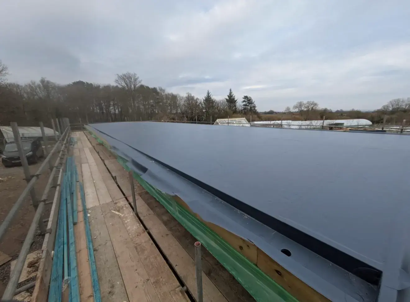Completed single ply membrane roof
